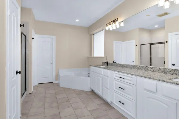 a view of a bathroom with a glass door