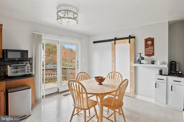 a bedroom with a bed and a television