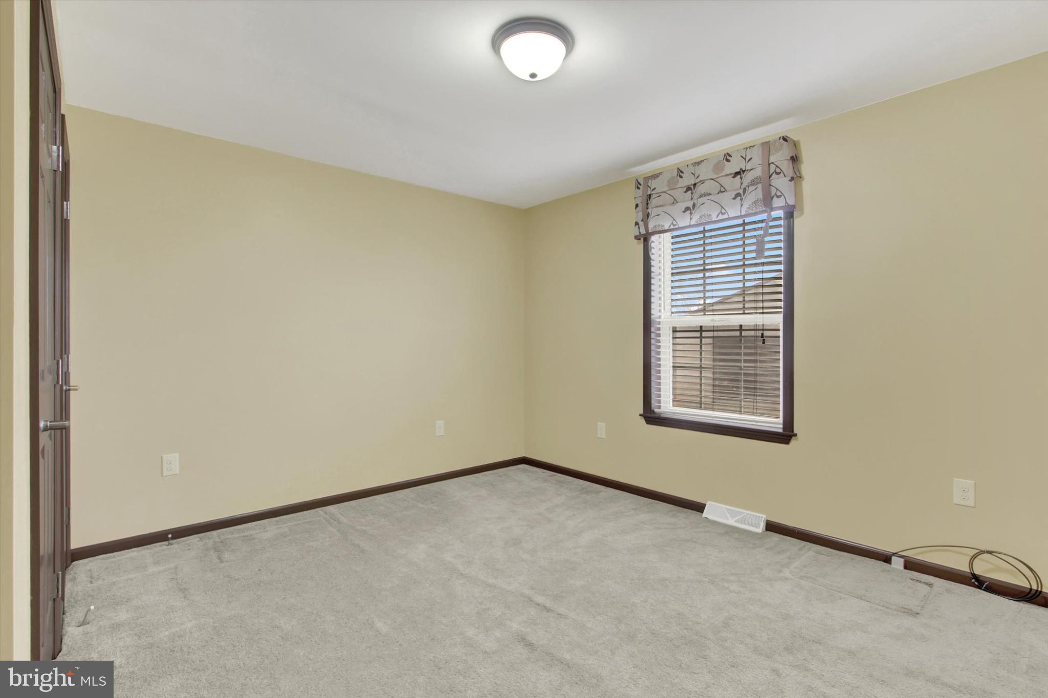 893 Georgetown Road Littlestown, PA 17340 - Photo 18 of 35 an empty room with windows
