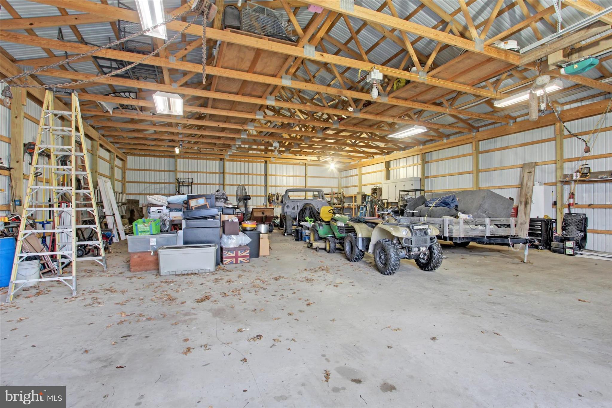 893 Georgetown Road Littlestown, PA 17340 - Photo 21 of 35 a view of a garage with a table and chairs