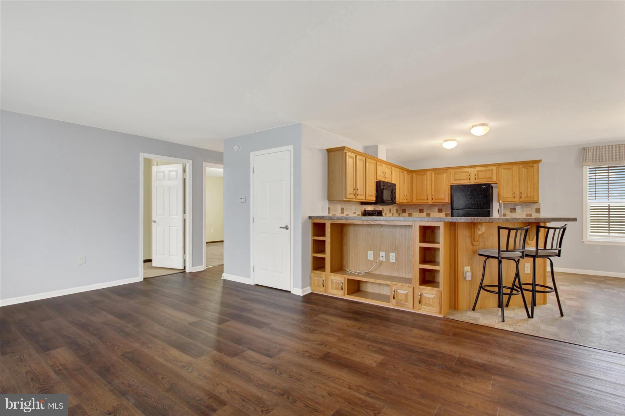 893 Georgetown Road Littlestown, PA 17340 - Photo 5 of 35 a view of kitchen with furniture and wooden floor