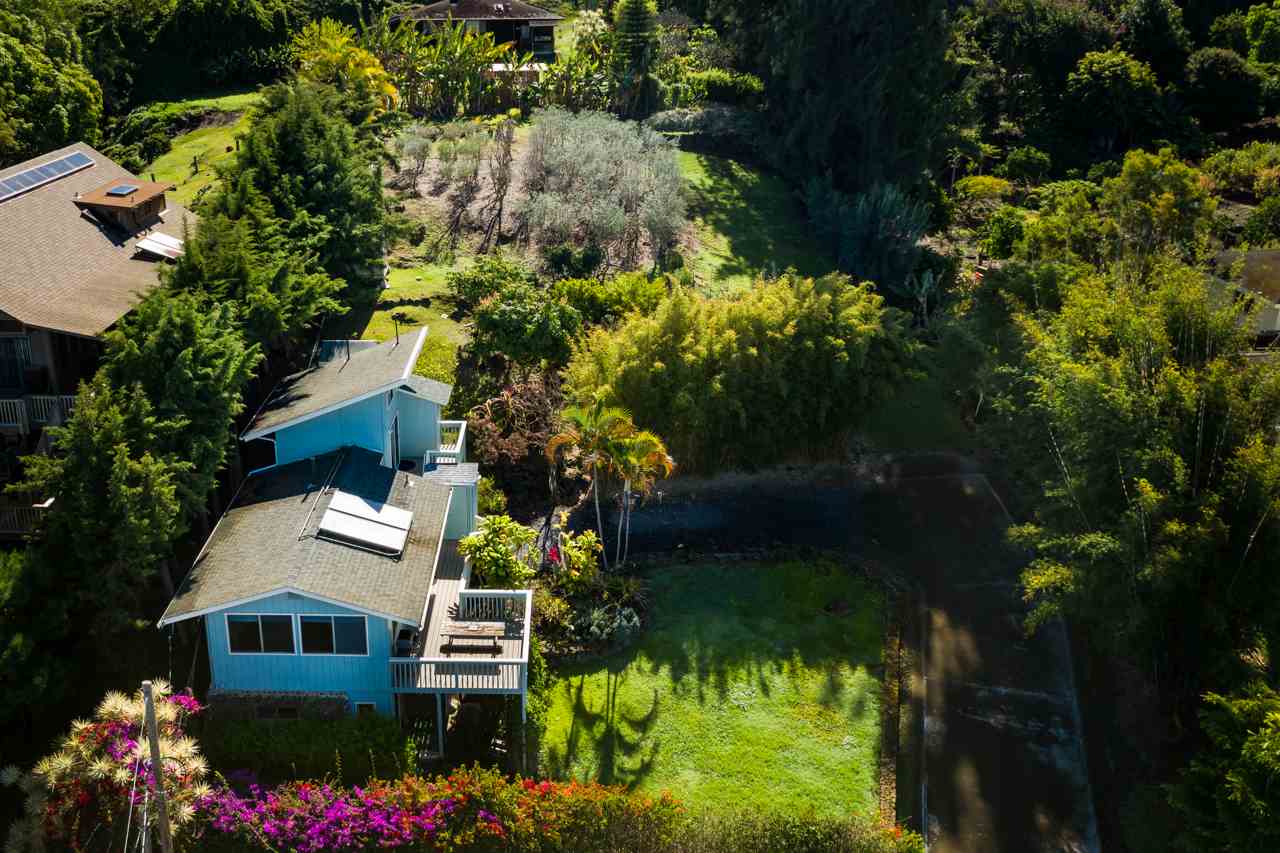 3515 Lower Kula Road Kula, HI 96790 - Photo 3 of 30 a view of a house with a yard and garden