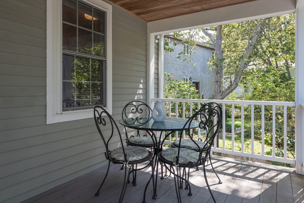 376 Monomoscoy Road Mashpee, MA 02649 - Photo 11 of 31 a view of a outdoor seating area with furniture