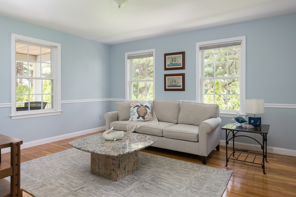 376 Monomoscoy Road Mashpee, MA 02649 - Photo 17 of 31 a living room with furniture and a window