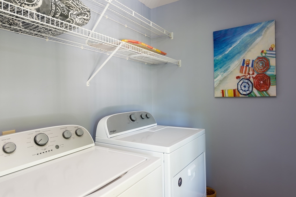 376 Monomoscoy Road Mashpee, MA 02649 - Photo 26 of 31 a utility room with dryer and washer