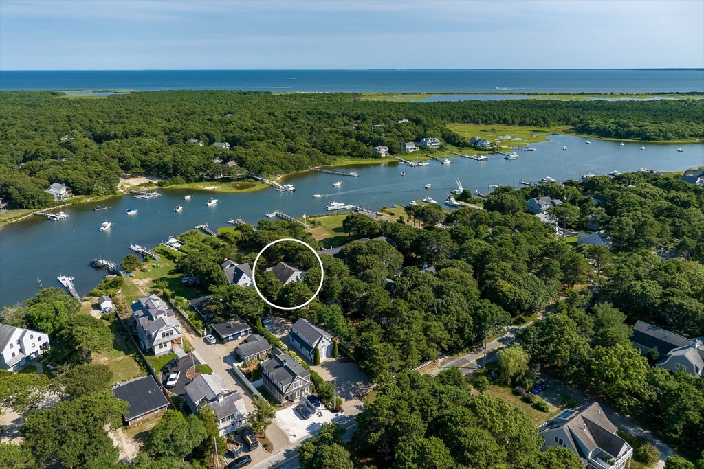 376 Monomoscoy Road Mashpee, MA 02649 - Photo 28 of 31 an aerial view of a house with a lake view