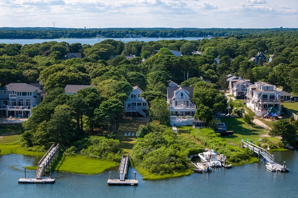 376 Monomoscoy Road Mashpee, MA 02649 - Photo 30 of 31 an aerial view of a house with a yard