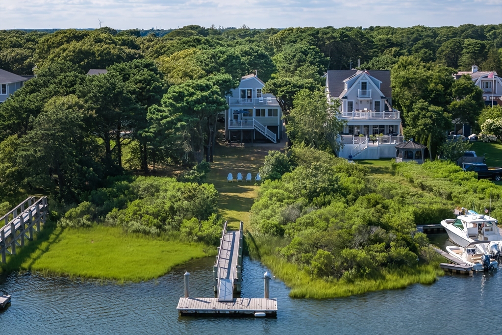 376 Monomoscoy Road Mashpee, MA 02649 - Photo 31 of 31 a front view of a house with a yard