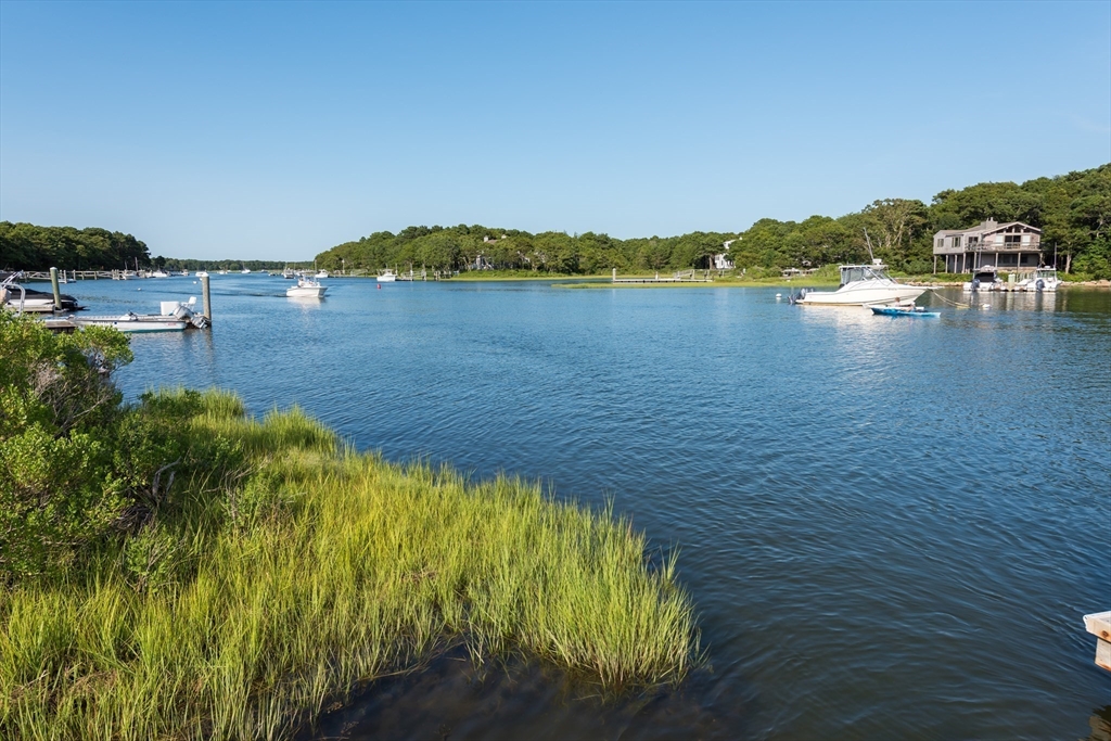 376 Monomoscoy Road Mashpee, MA 02649 - Photo 5 of 31 a view of lake with houses