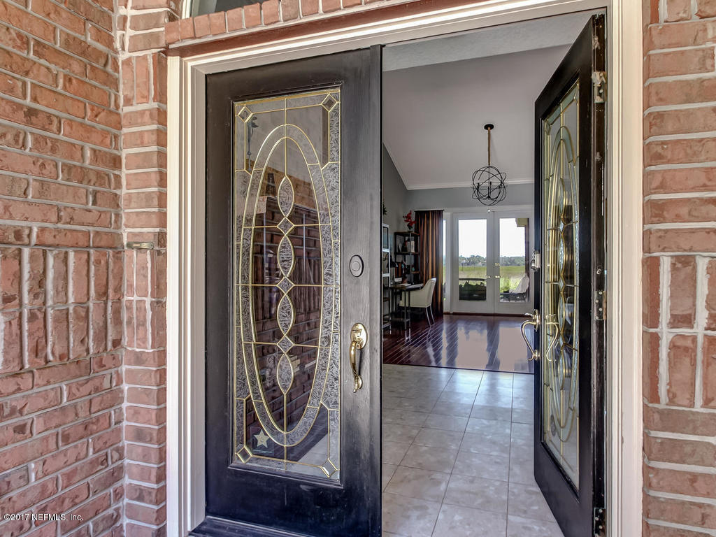 1198 Neck Road Ponte Vedra Beach, FL 32082 - Photo 15 of 101 a view of a entryway door front of house
