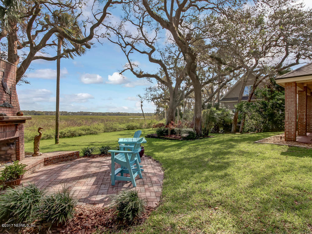 1198 Neck Road Ponte Vedra Beach, FL 32082 - Photo 75 of 101 a view of a garden with an outdoor space