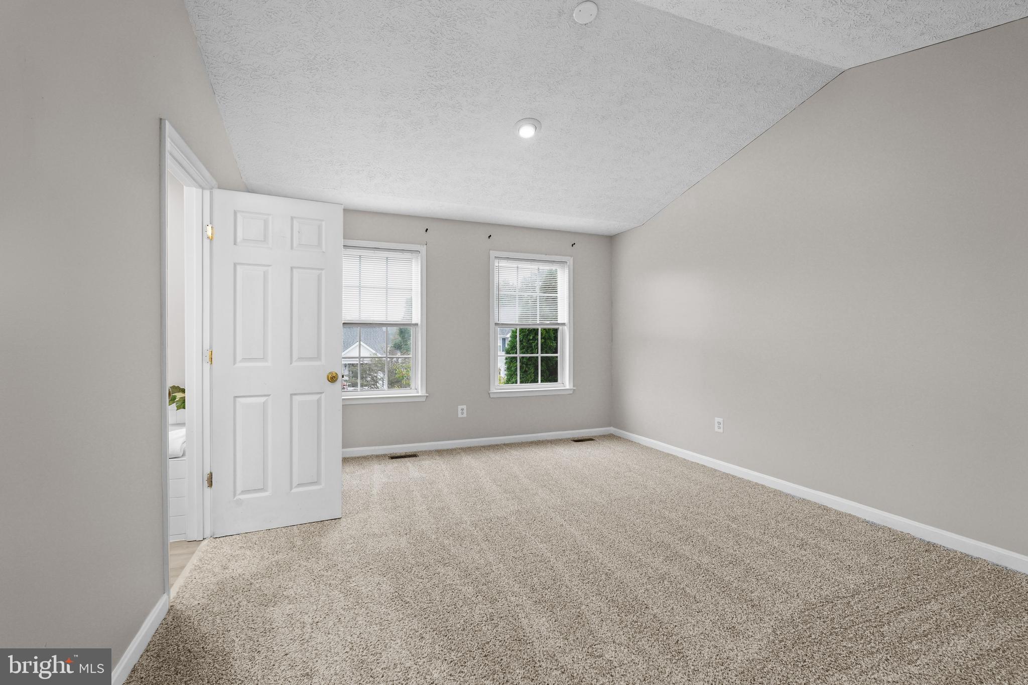 102 Broad Leaf Court Rising Sun, MD 21911 - Photo 10 of 24 Primary bedroom with vaulted ceilings