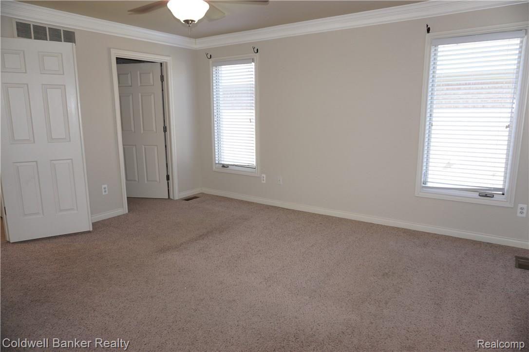 21418 Raintree Drive Macomb, MI 48044 - Photo 11 of 21 Raintree First Floor Master Suite 2 Walk-in Closets.jpg
