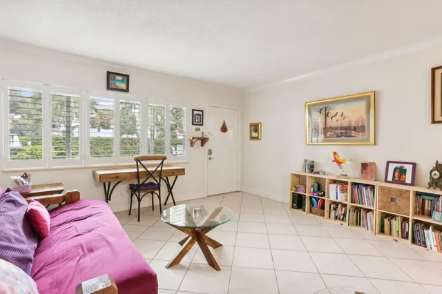 a kitchen with stainless steel appliances granite countertop a sink and refrigerator