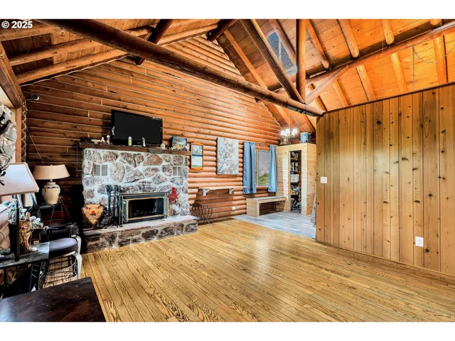 a view of livingroom with furniture and fireplace
