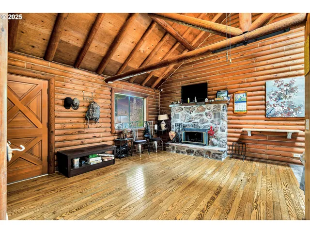 a view of livingroom with furniture and fireplace