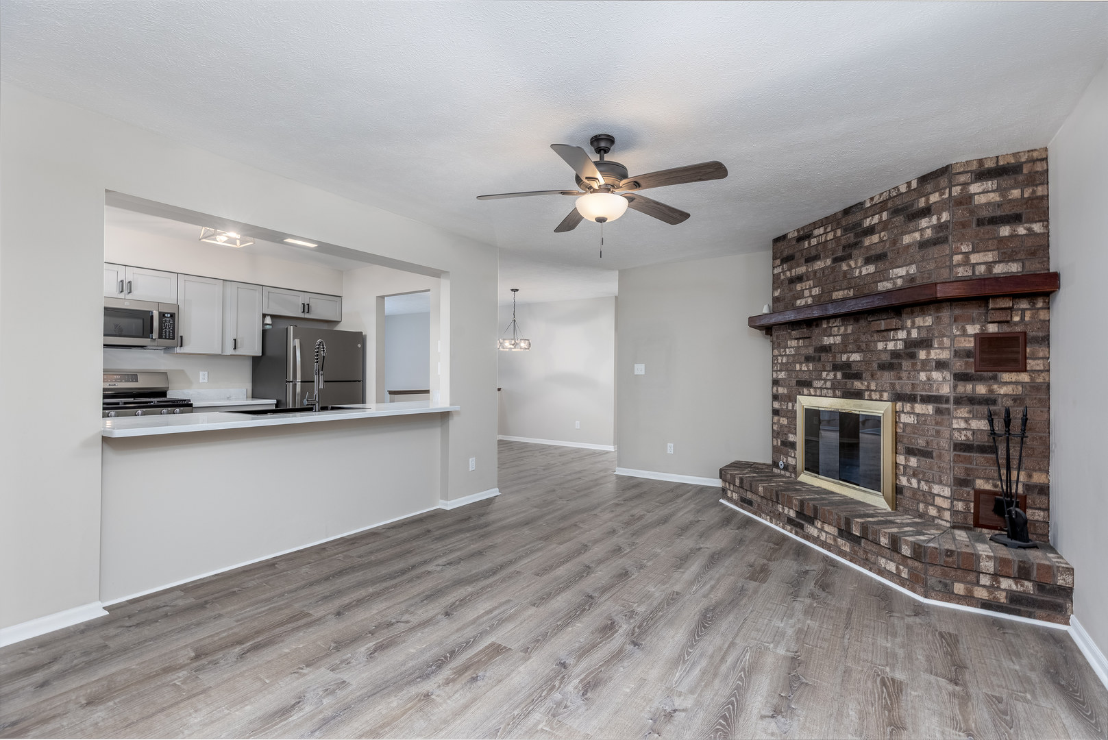 1001 4-H Road Ottawa, IL 61350 - Photo 11 of 25 a view of a kitchen with a sink and a stove top oven