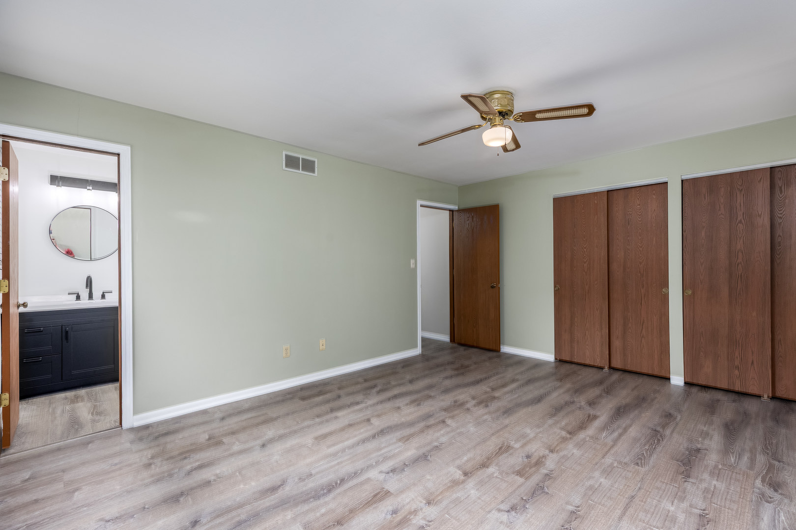 1001 4-H Road Ottawa, IL 61350 - Photo 16 of 25 wooden floor in an empty room with a window