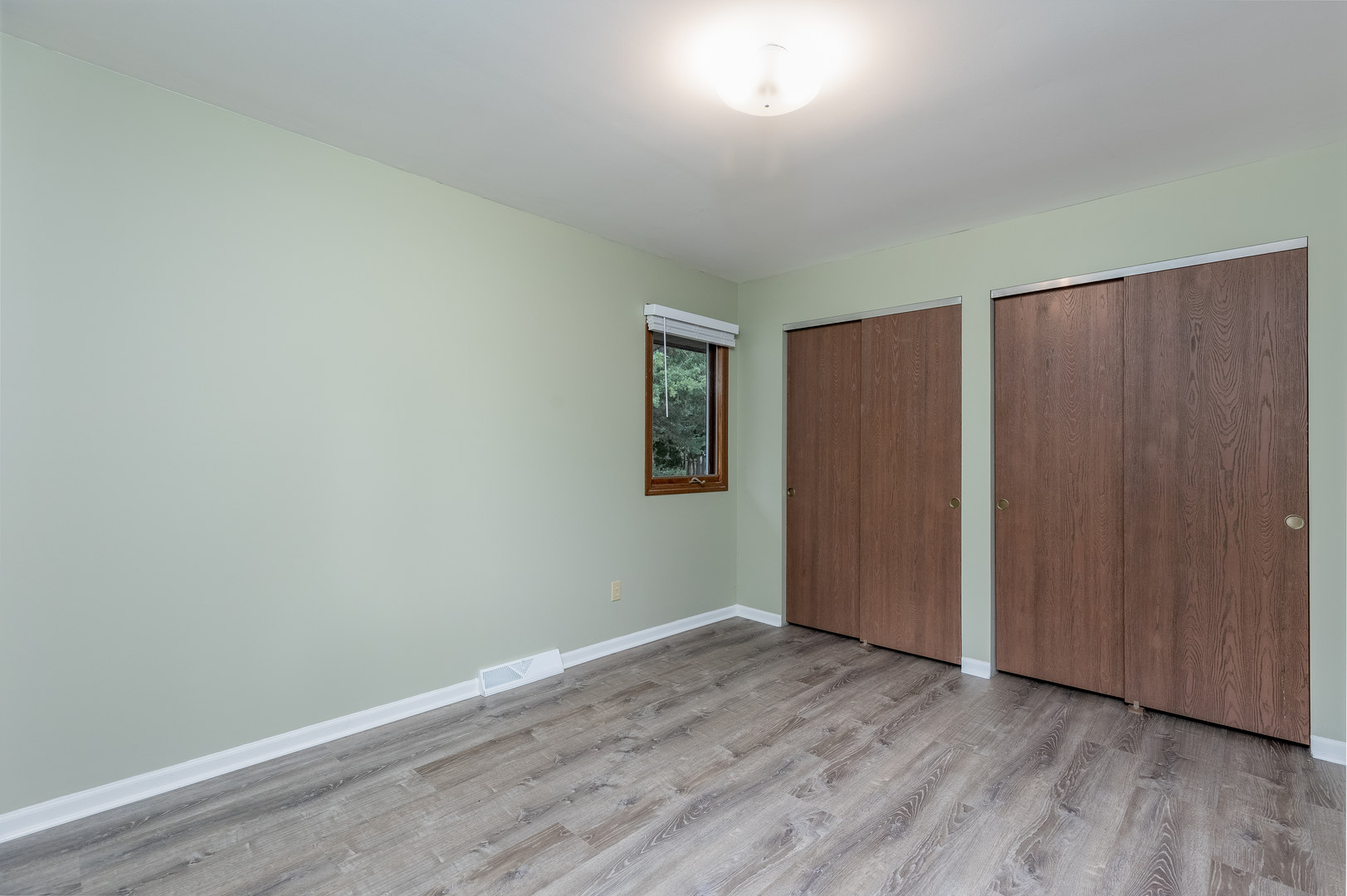 1001 4-H Road Ottawa, IL 61350 - Photo 17 of 25 an empty room with wooden floor and closet area