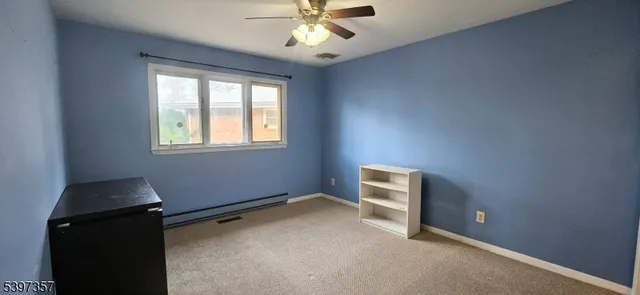 wooden floor and window in an empty room