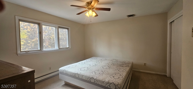 934 Lowden Avenue Union, NJ 07083 - Photo 15 of 25 a bedroom with a bed and a window