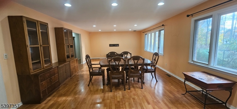 934 Lowden Avenue Union, NJ 07083 - Photo 5 of 25 a view of a dining room with furniture and wooden floor