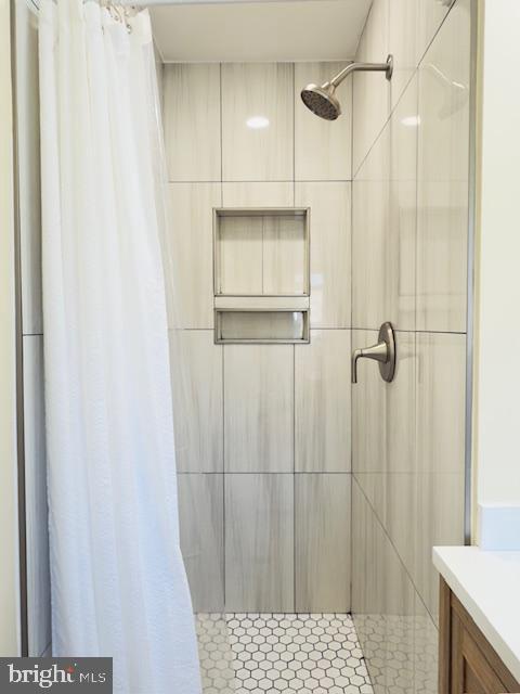 3709 Monterey Road Baltimore, MD 21218 - Photo 19 of 30 a bathroom with a shower and a sink