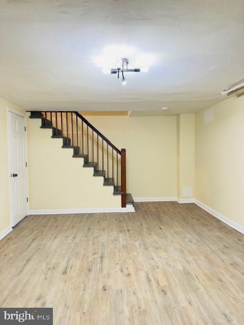 3709 Monterey Road Baltimore, MD 21218 - Photo 21 of 30 a view of an empty room with stairs