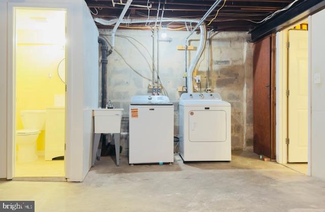 3709 Monterey Road Baltimore, MD 21218 - Photo 23 of 30 a utility room with dryer and washer