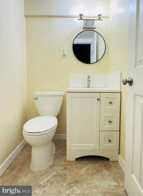 3709 Monterey Road Baltimore, MD 21218 - Photo 25 of 30 a bathroom with a sink and a mirror