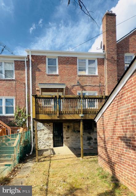 3709 Monterey Road Baltimore, MD 21218 - Photo 28 of 30 a front view of a house with glass door