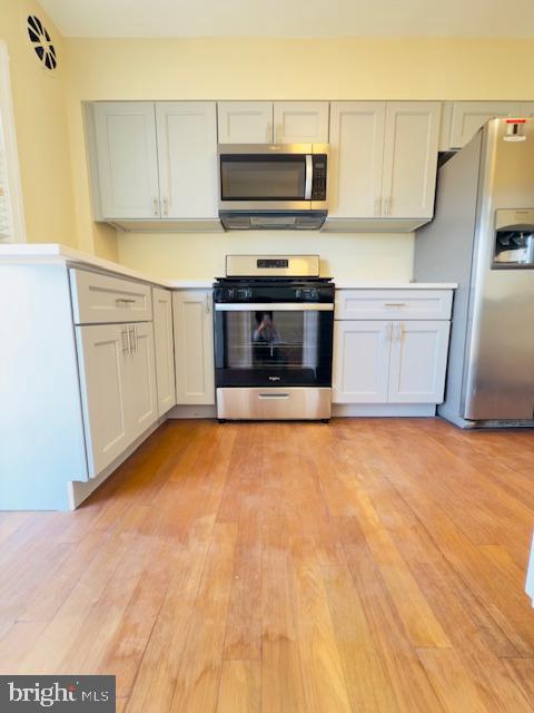3709 Monterey Road Baltimore, MD 21218 - Photo 8 of 30 a kitchen with a sink and steel appliances