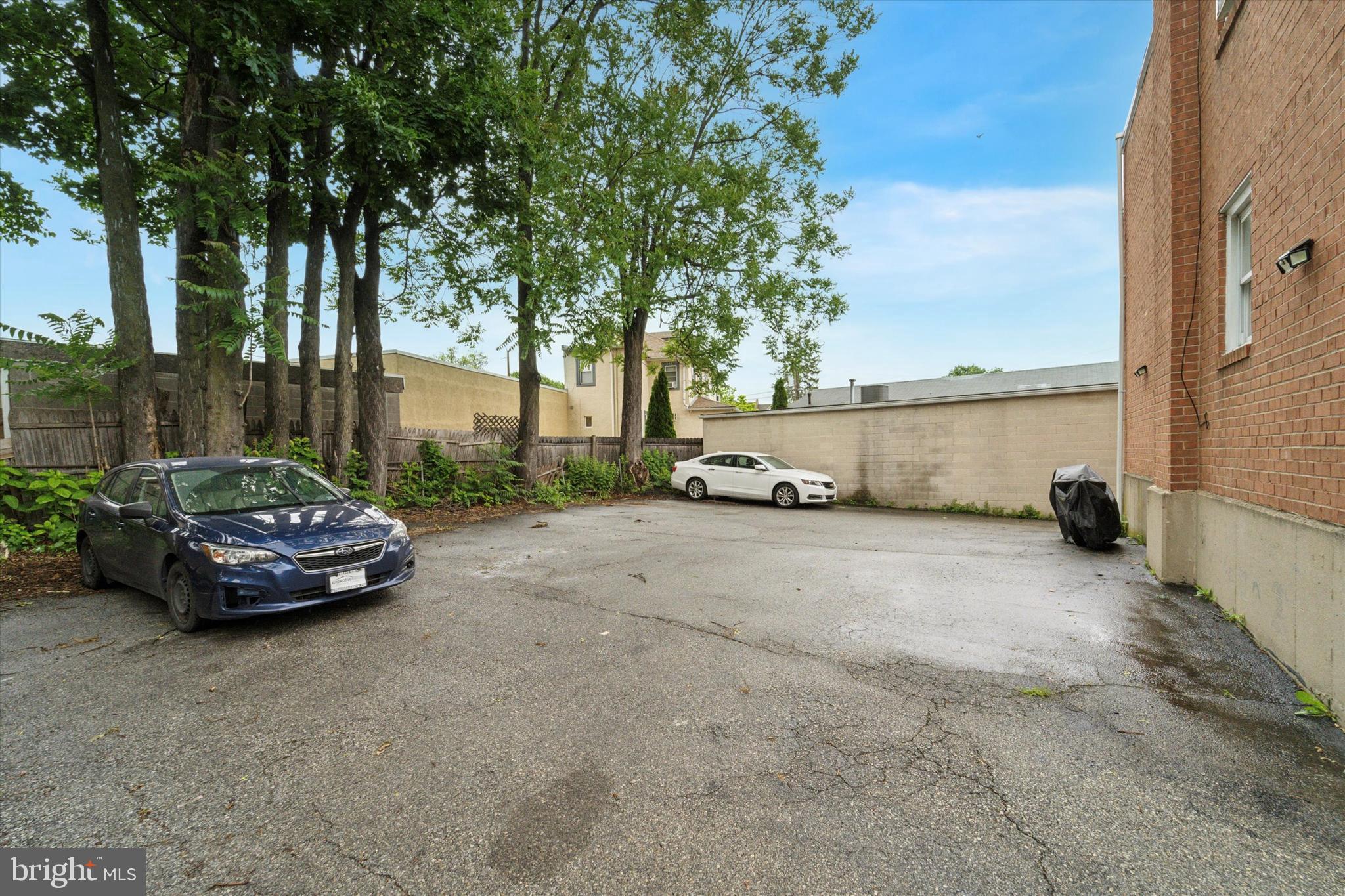 3819-3821 Garrett Road Drexel Hill, PA 19026 - Photo 5 of 24 a car parked on the side of the road