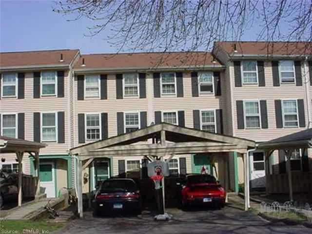 88 Rising Trail Drive, Unit 88 Middletown, CT 06457 - Photo 1 of 1 a car parked in front of a building