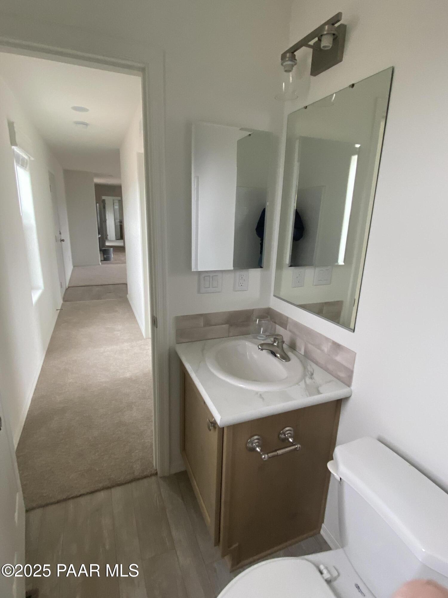 215 West Venice Way Paulden, AZ 86334 - Photo 10 of 40 a bathroom with a sink toilet and mirror