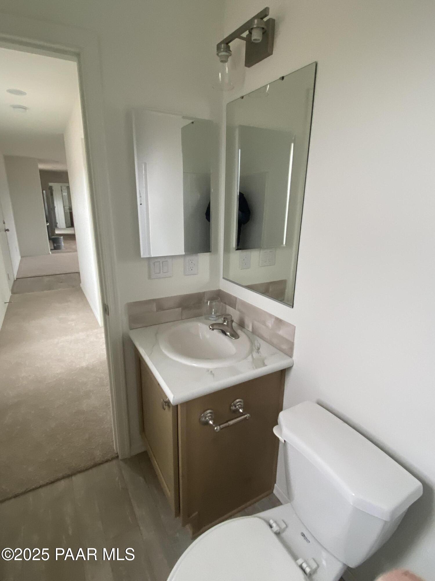 215 West Venice Way Paulden, AZ 86334 - Photo 11 of 40 a bathroom with a sink toilet and mirror