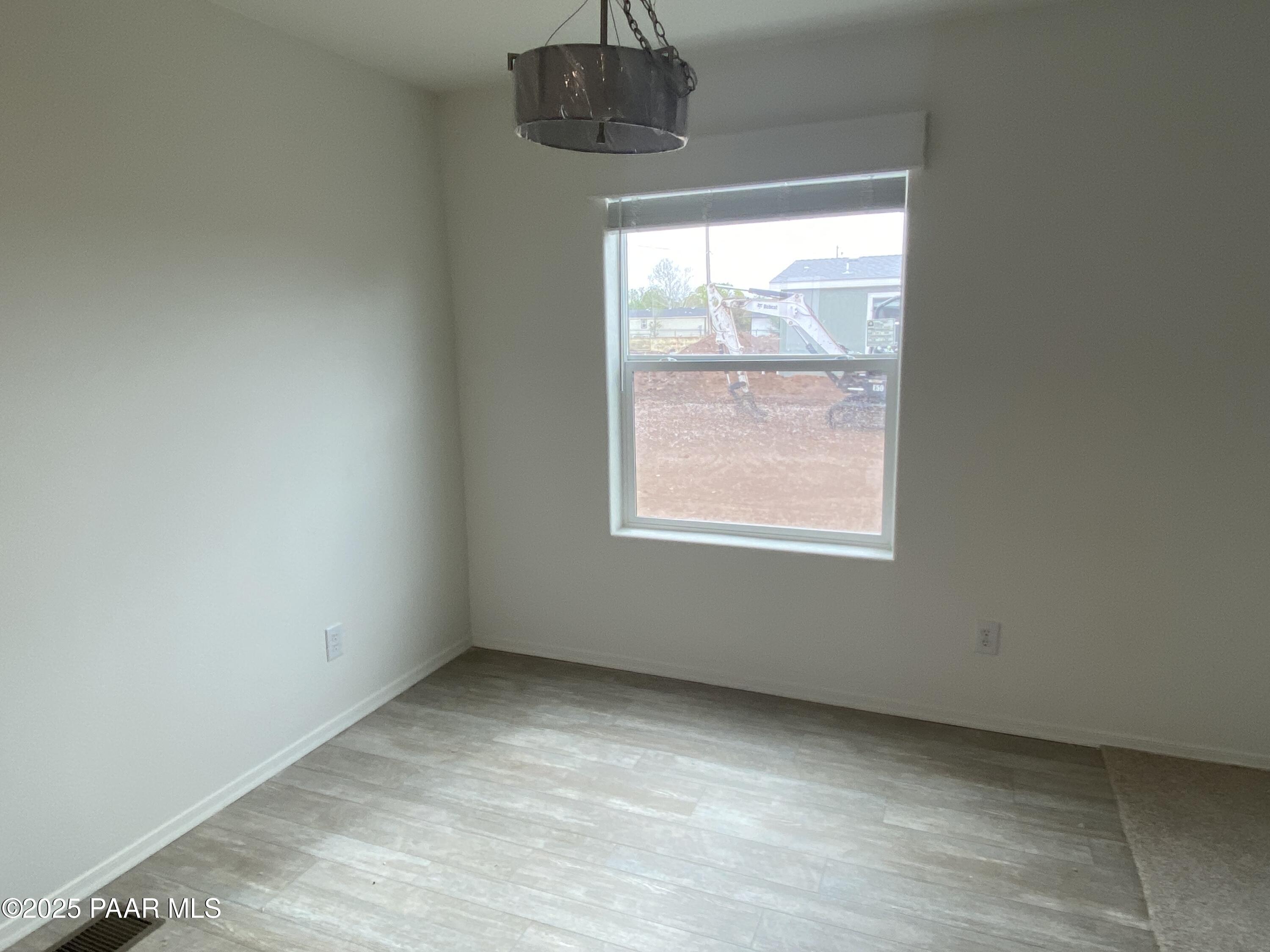 215 West Venice Way Paulden, AZ 86334 - Photo 20 of 40 an empty room with a window