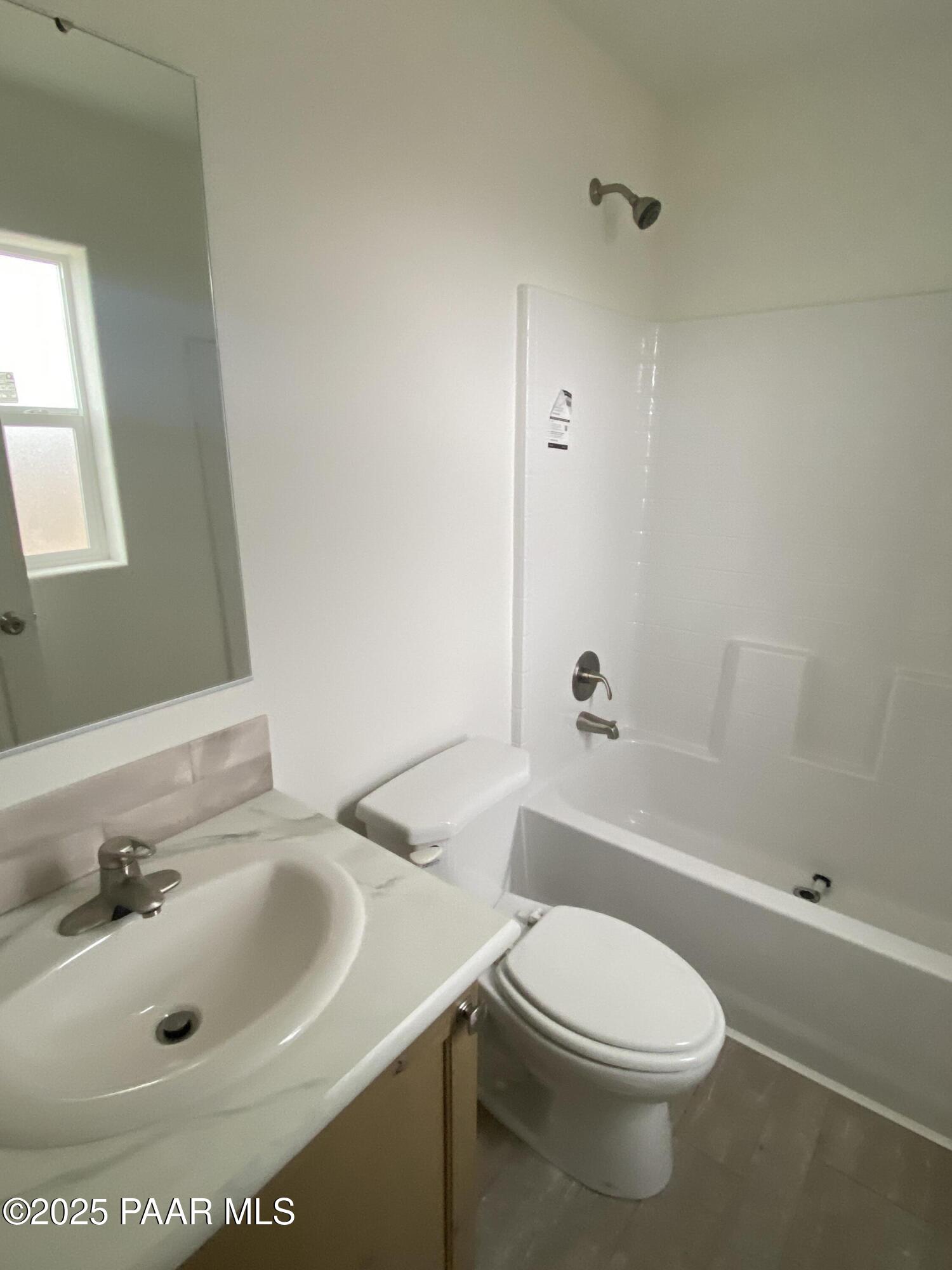 215 West Venice Way Paulden, AZ 86334 - Photo 26 of 40 a bathroom with a sink toilet and shower
