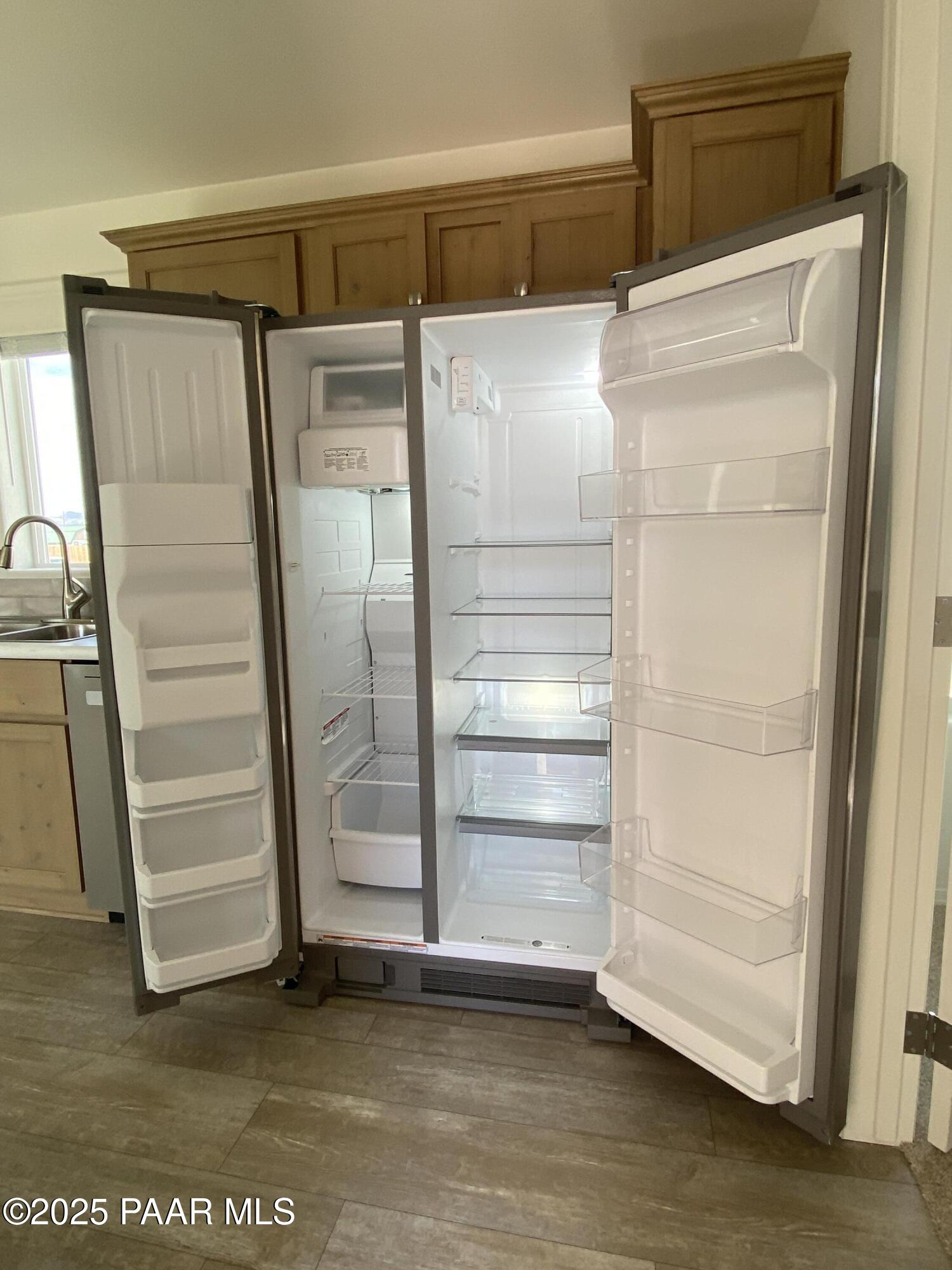 215 West Venice Way Paulden, AZ 86334 - Photo 33 of 40 a view of walk in closet with empty racks