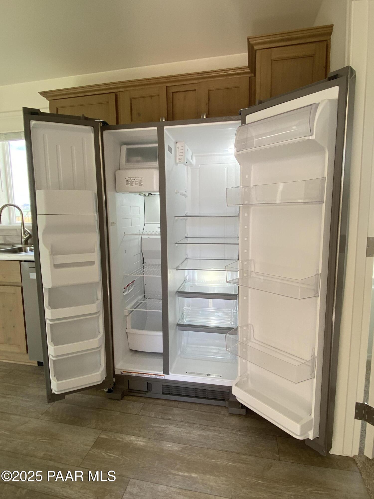 215 West Venice Way Paulden, AZ 86334 - Photo 34 of 40 a view of walk in closet with empty racks