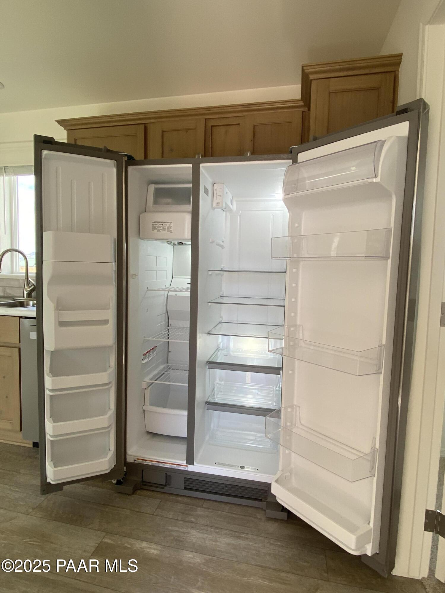 215 West Venice Way Paulden, AZ 86334 - Photo 35 of 40 a refrigerator freezer sitting inside of a room