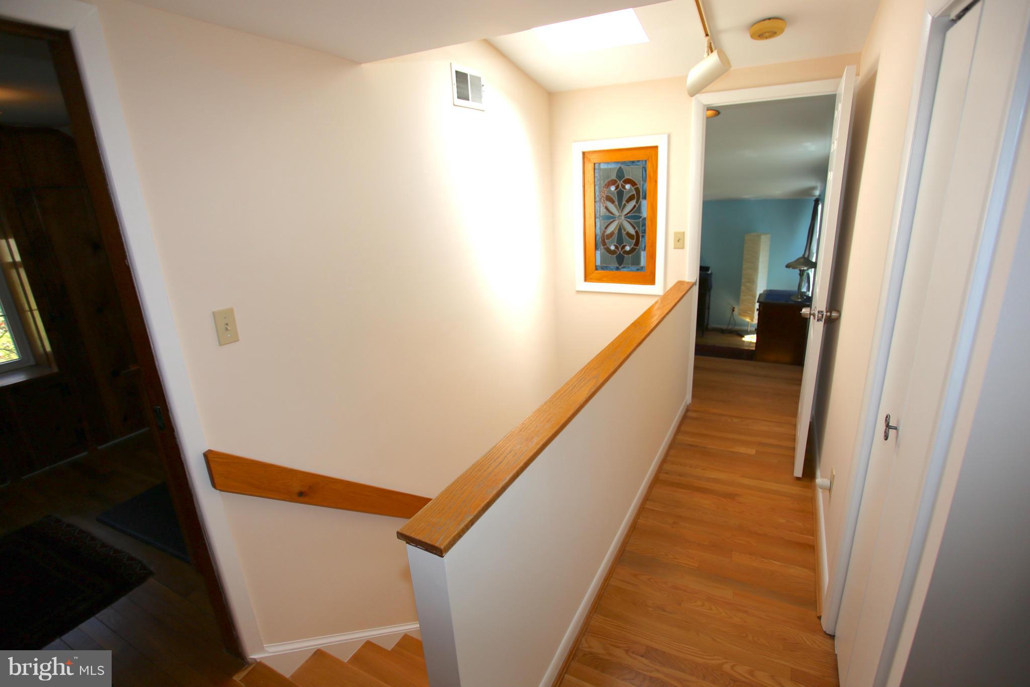 10403 Hayes Avenue Silver Spring, MD 20902 - Photo 13 of 30 Upstairs Landing with Stained Glass Window