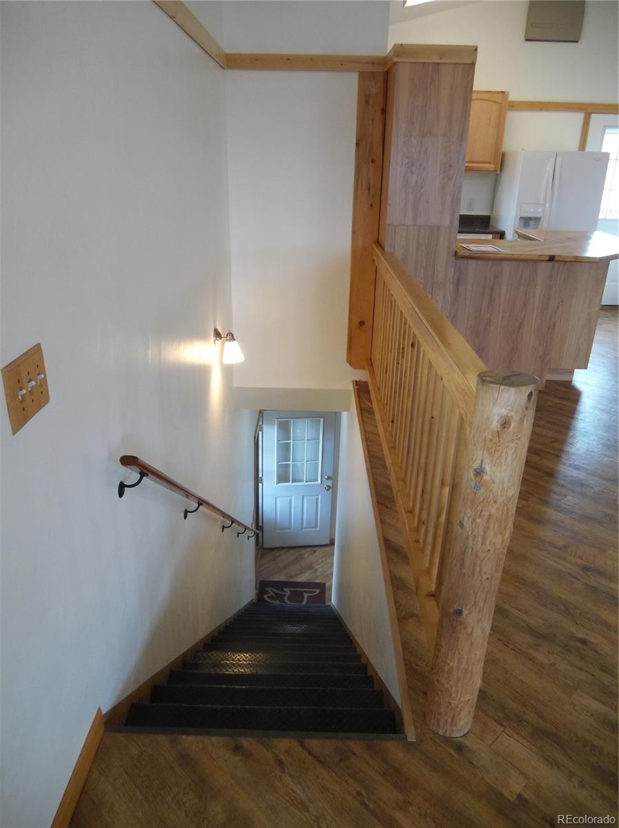 10299 Kingsview Road Austin, CO 81410 - Photo 2 of 40 a view of entryway and hall with wooden floor