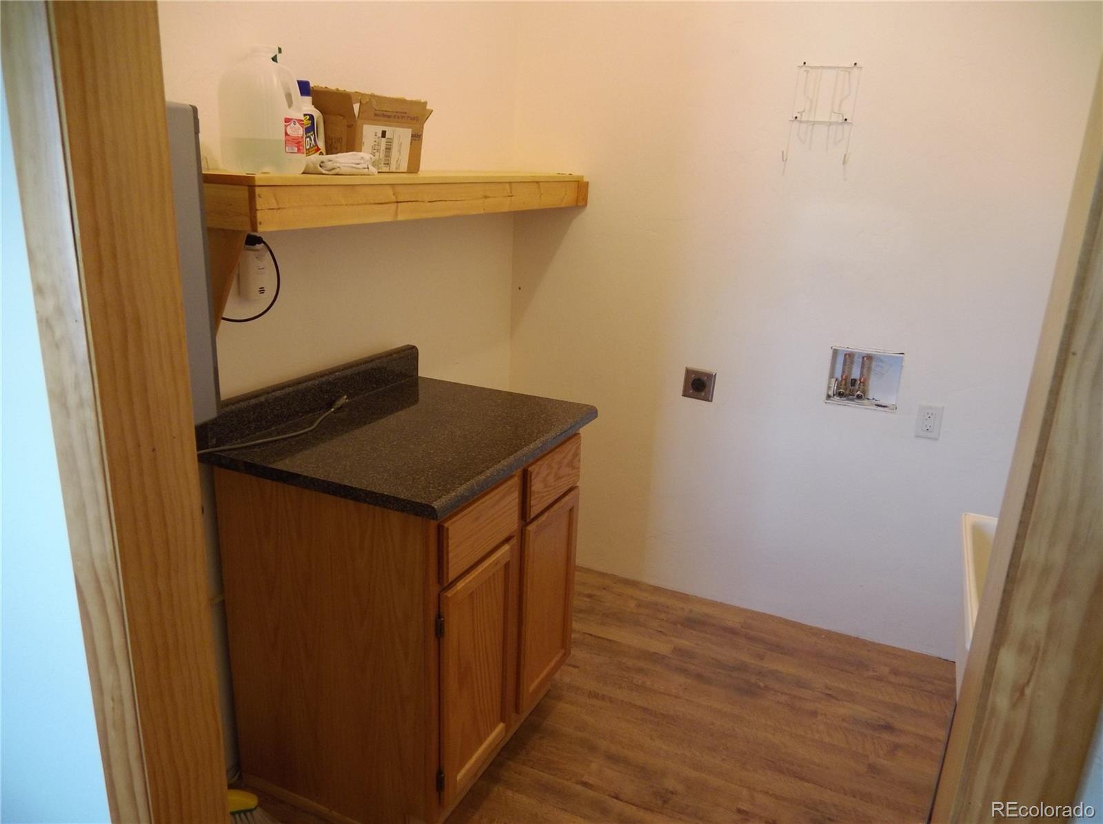 10299 Kingsview Road Austin, CO 81410 - Photo 27 of 40 a utility room with dryer and washer