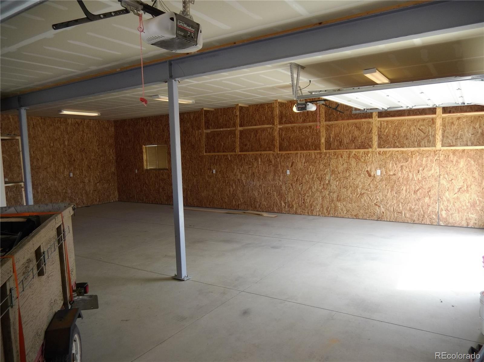 10299 Kingsview Road Austin, CO 81410 - Photo 32 of 40 a view of a room with wooden floor
