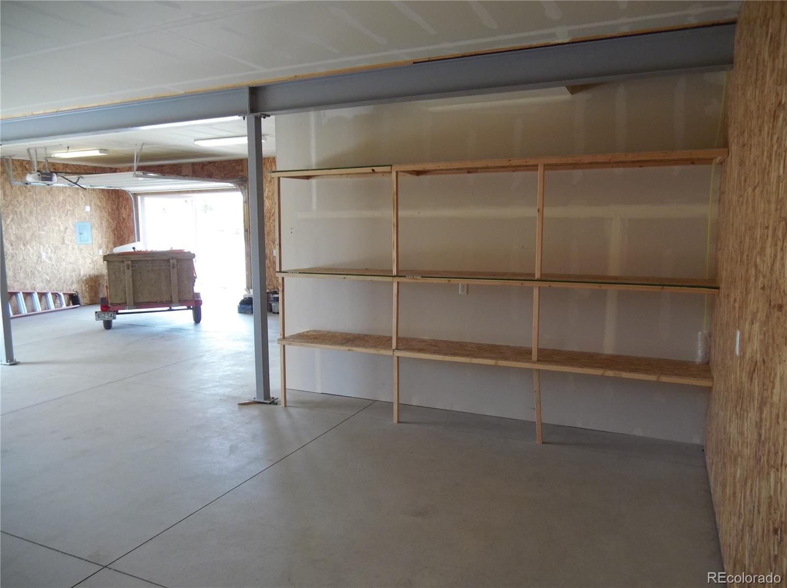 10299 Kingsview Road Austin, CO 81410 - Photo 36 of 40 a view of a room with racks on the wall