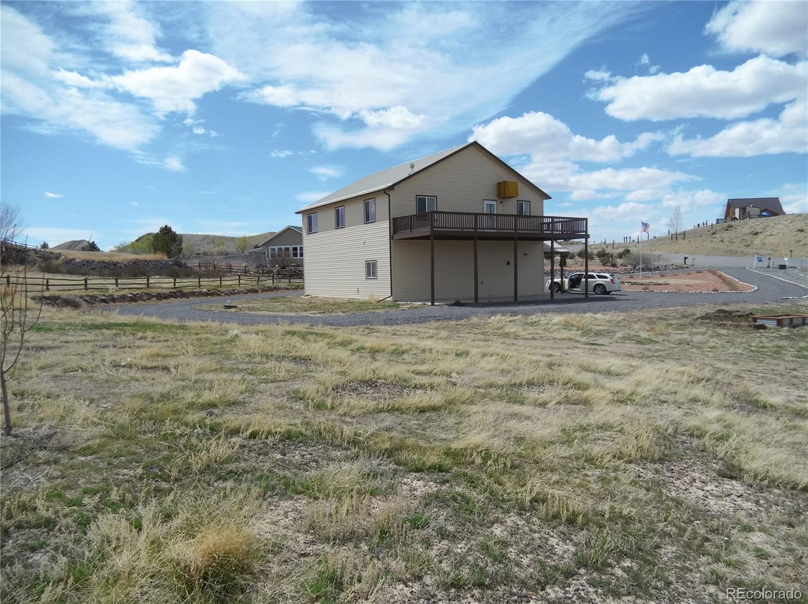 10299 Kingsview Road Austin, CO 81410 - Photo 40 of 40 a view of a house with a yard