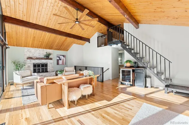 a view of a house with pool table and chairs