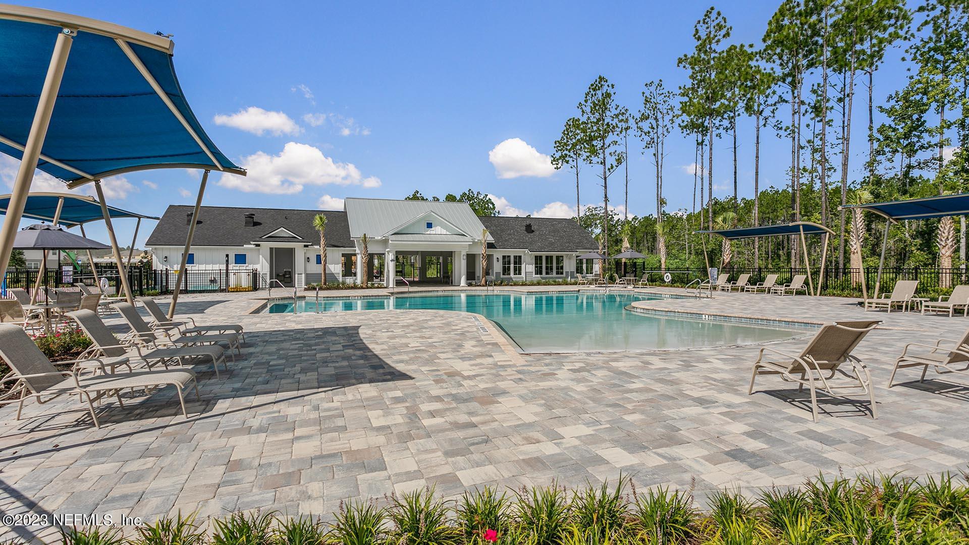 63 Java Lane St. Augustine, FL 32092 - Photo 31 of 41 a view of a lake with a patio