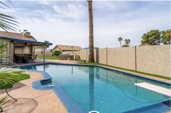 a view of an outdoor sitting area with furniture